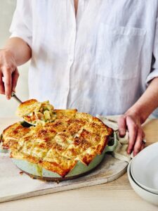 Comforting country chicken pie being served